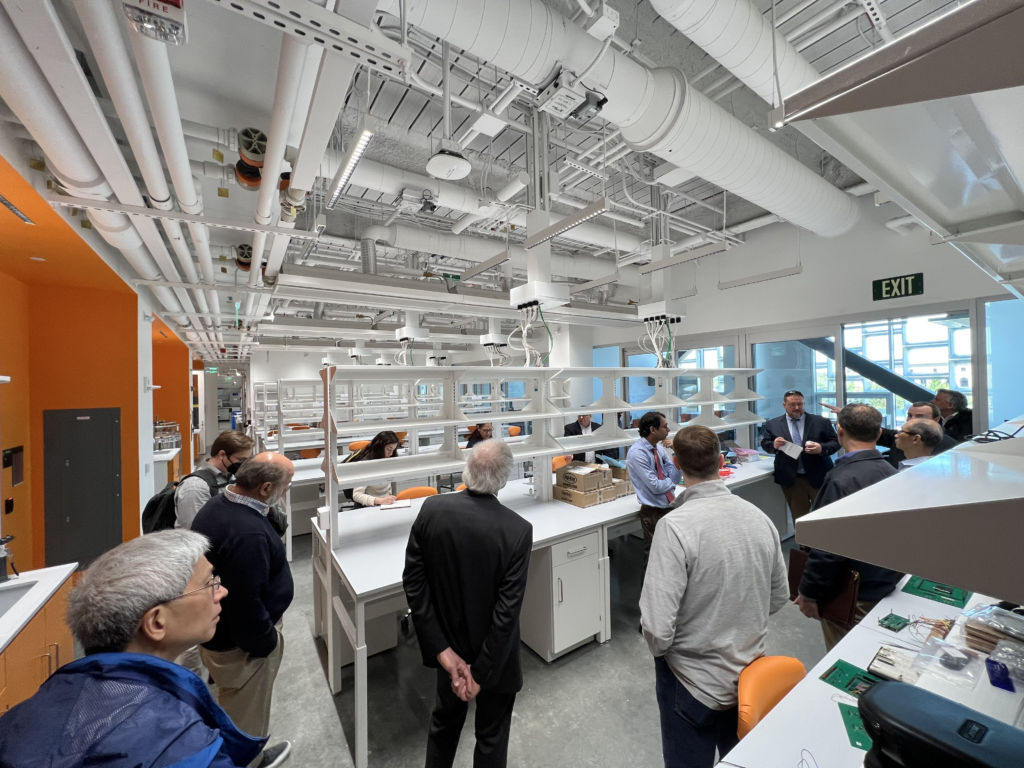 Quentin Gilly, Assistant Director, FAS Energy and Sustainability with the Office for Sustainability, and President of the I2SL New England Chapter, (right), leads a tour of I2SL members through the Science and Engineering Complex in the fall of 2022.