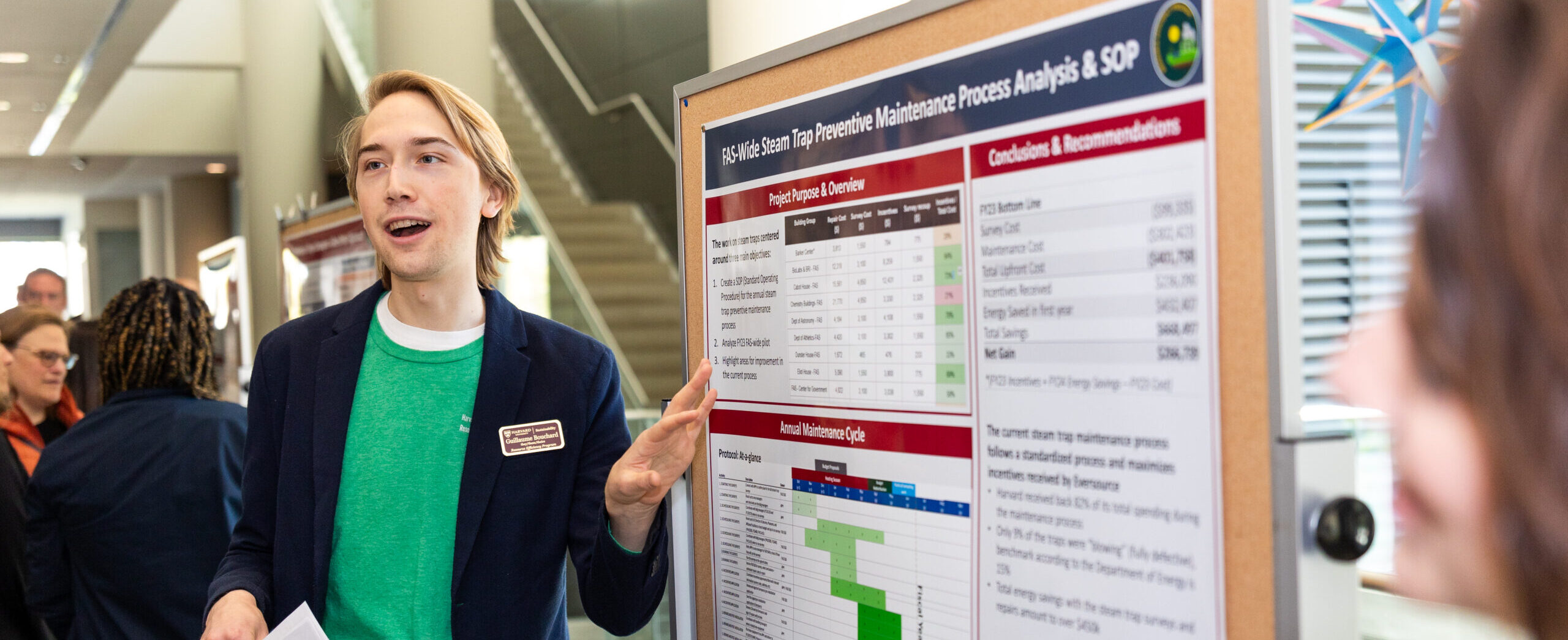 Resource Efficiency Program representative presenting at a poster session