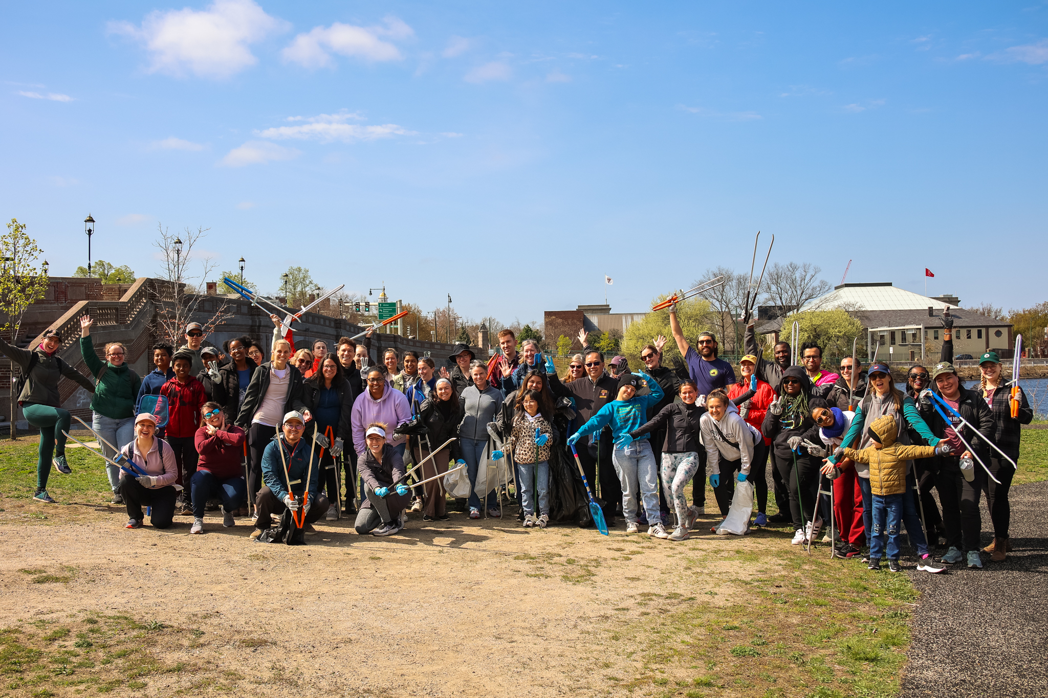 A group of volunteers pose for a photo at the 2023 Earth Day Charles River Clean-Up.